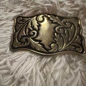 Intricate Gold and Black Belt Buckle